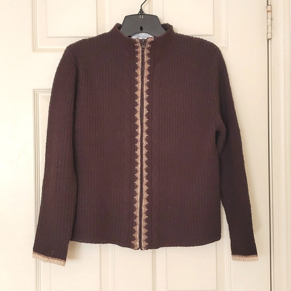 Woman's full zip and 1" neck cardigan sweater with multi color front design.
